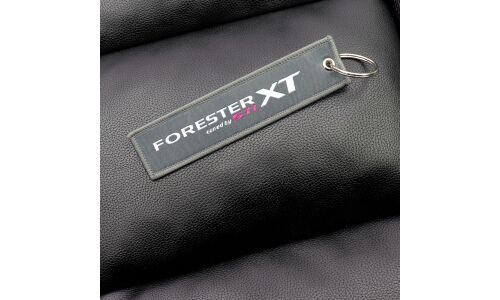 Брелок тканевый с вышивкой «STI», серого цвета